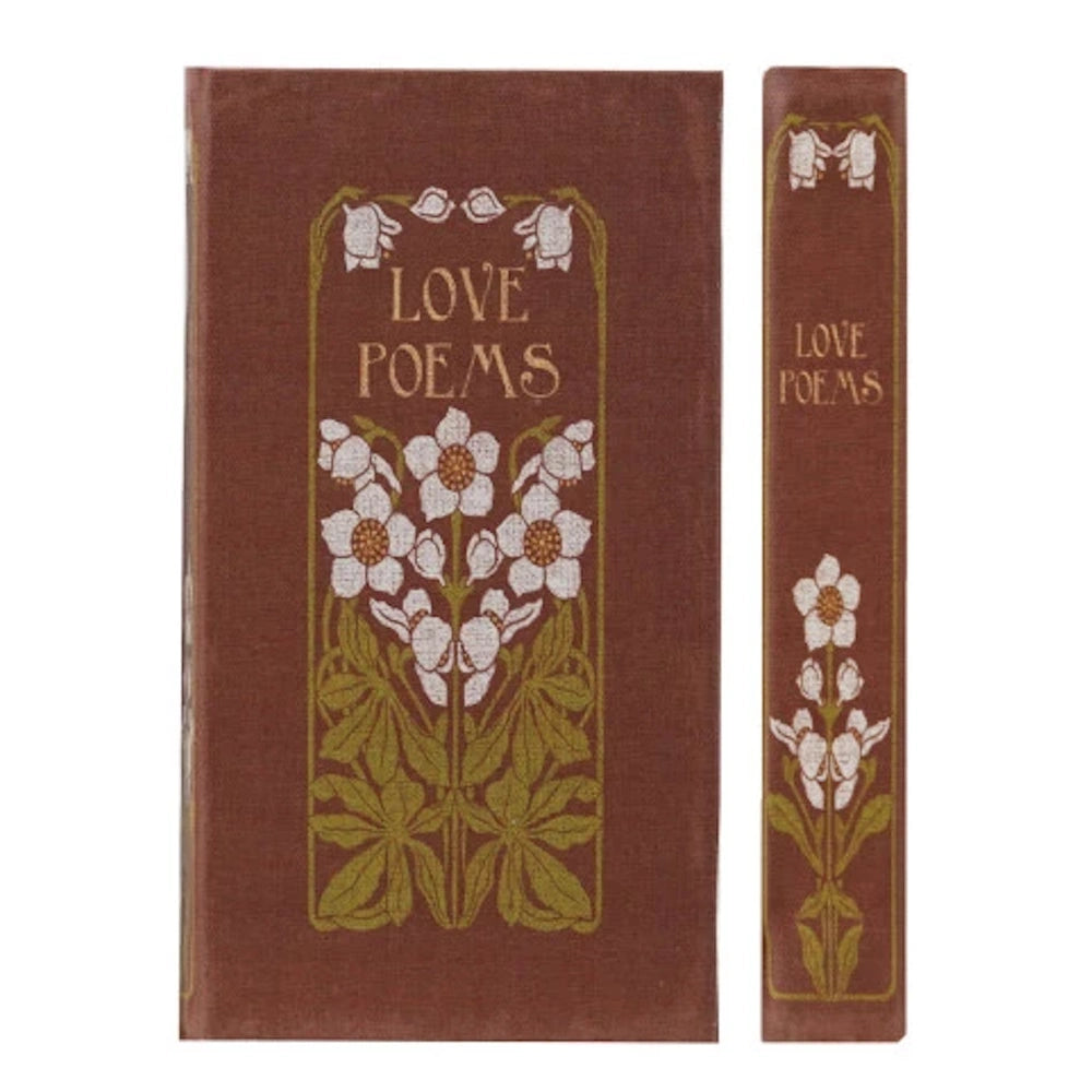 Vintage "Love Poems" notebook with a brown cloth cover, white floral art, and matching spine design on a white background.