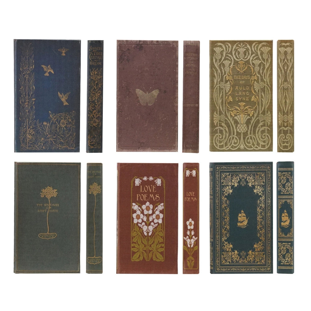 Vintage book covers and spines with gold floral, bird, and butterfly designs in various colors on a white background.