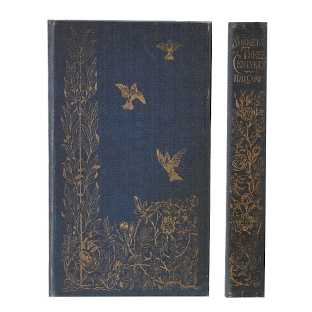 Vintage blue hardcover book "Sonnets of Three Centuries" featuring gold floral patterns and soaring bird illustrations.