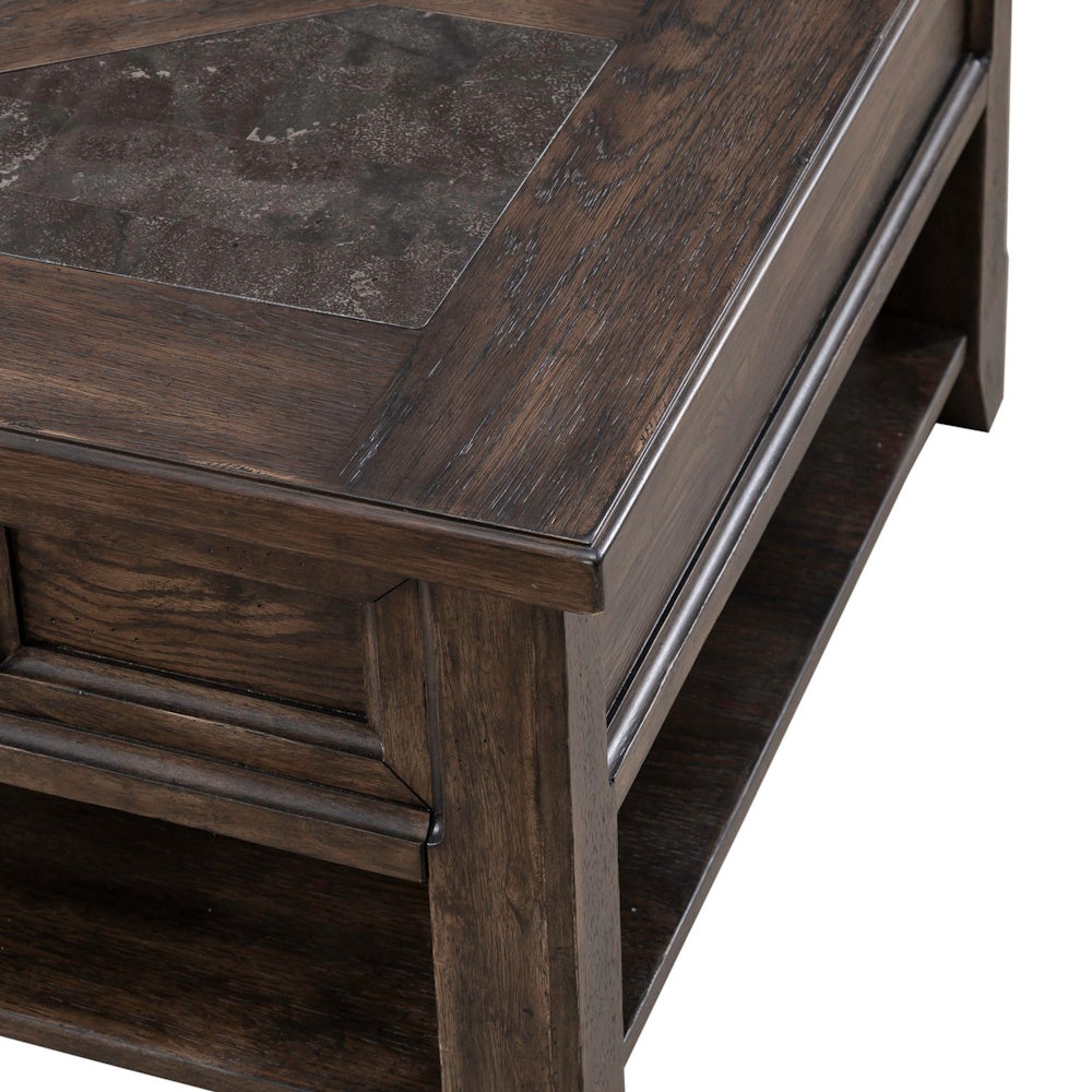 Close up of rustic dark wood coffee table corner with decorative inset top and open shelf storage design.