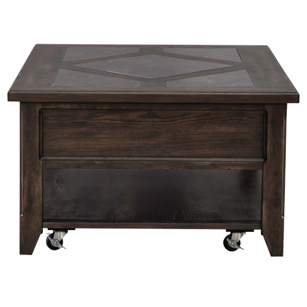 Rustic dark wood coffee table side view with decorative inset top, caster wheels and open storage shelf.