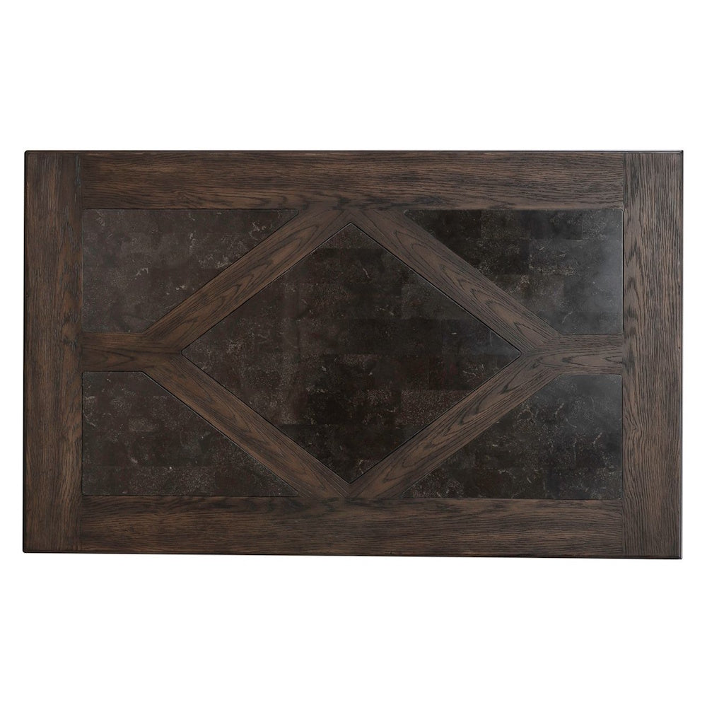 Top view of rustic dark wood coffee table with geometric slate inlay design and rectangular tabletop surface.