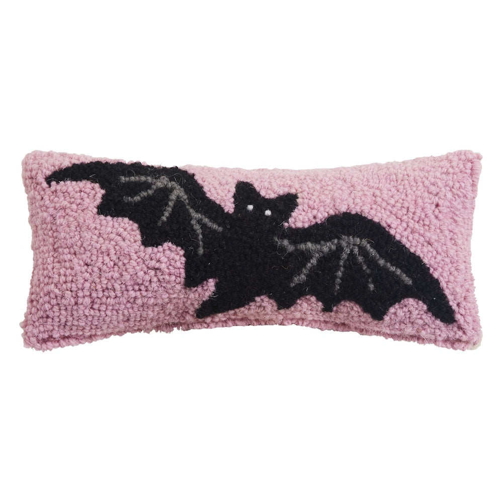 Pink hooked rectangular pillow featuring a black bat in flight with gray wing accents.