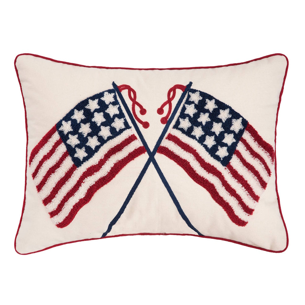 Rectangular off-white throw pillow featuring two crossed American flags in a textured, embroidered style.
