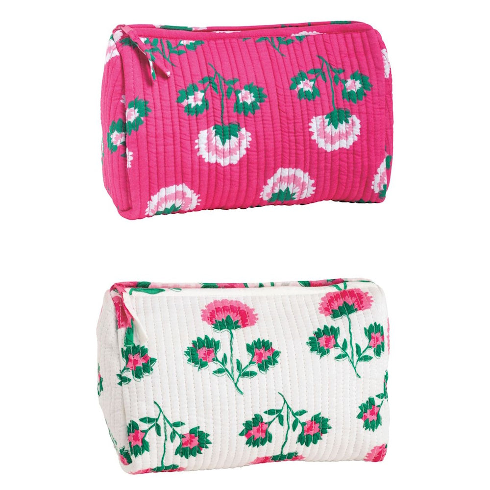 Pink and white quilted block-print makeup bags with floral patterns and zipper closures.