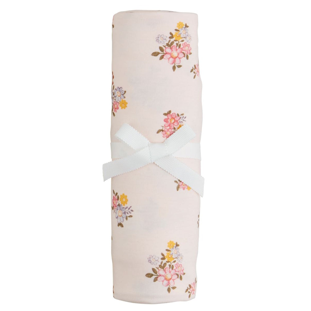 Pink floral soft knit baby swaddle blanket with white ribbon bow.