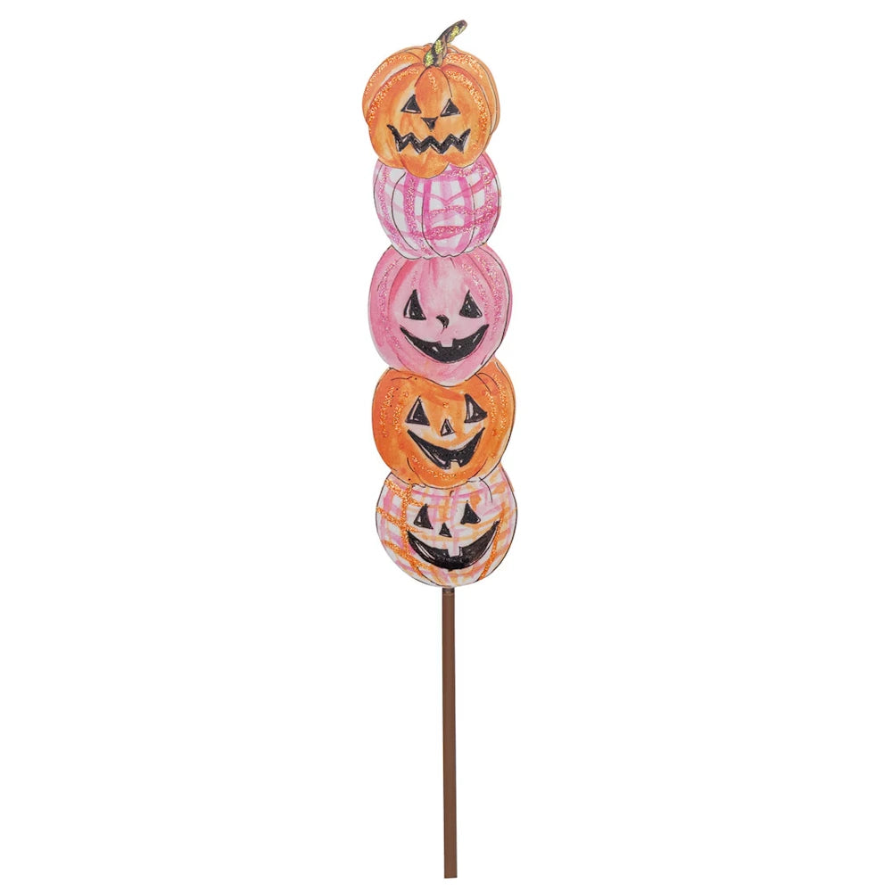 Stacked orange and pink plaid Halloween jack-o-lantern pumpkin yard stake decoration on a white background.