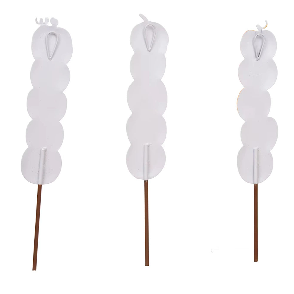 White metal kabob-shaped yard stakes resembling a stack of apples with brown stick handles on a white background.