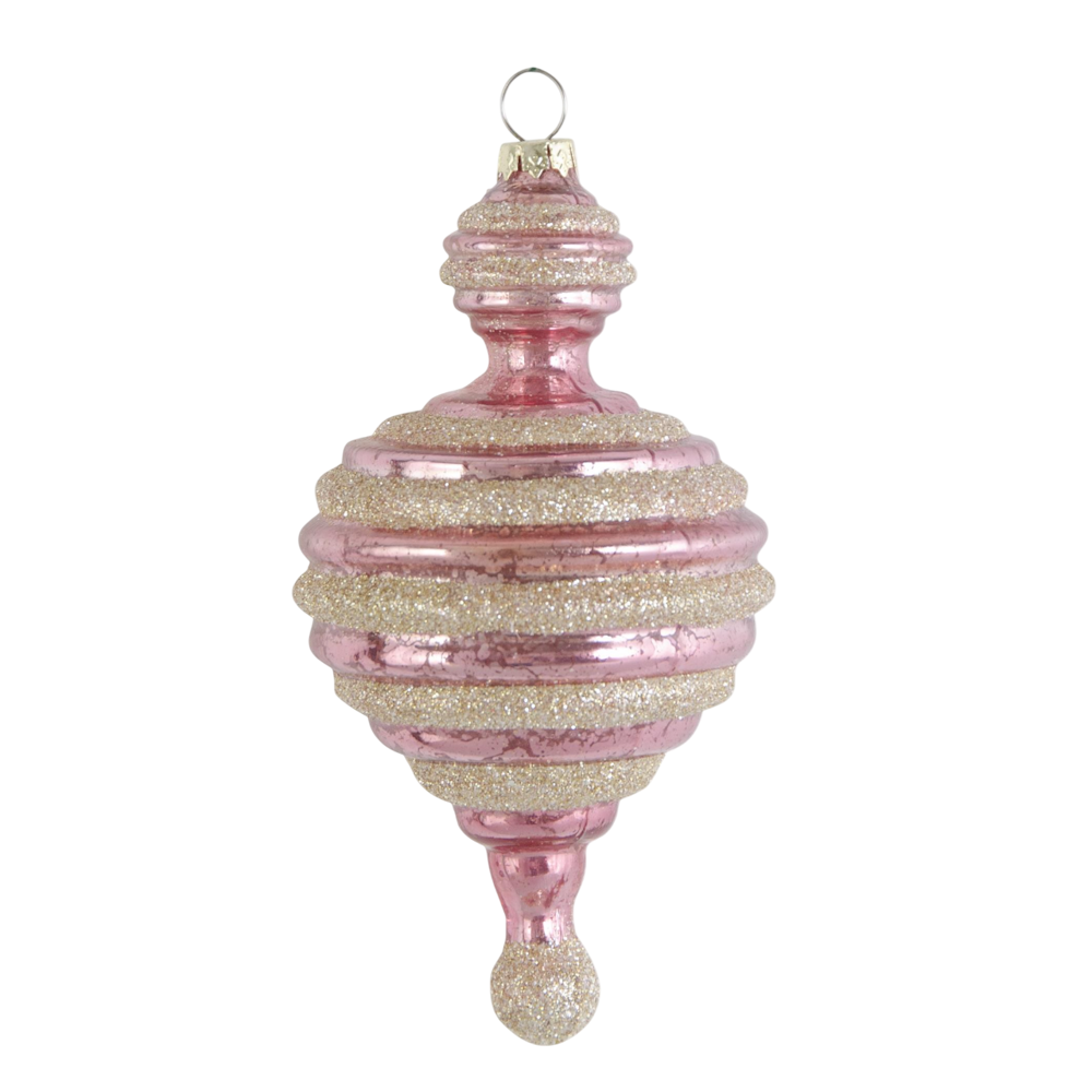 A ridged pink mercury glass ornament accented with horizontal champagne glitter stripes.