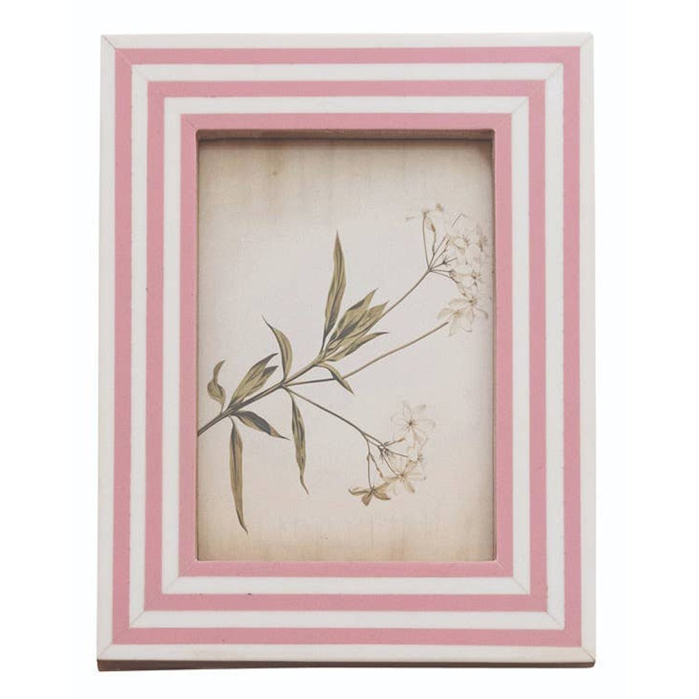Rectangular photo frame with pink and white inlaid stripes framing a botanical flower illustration.