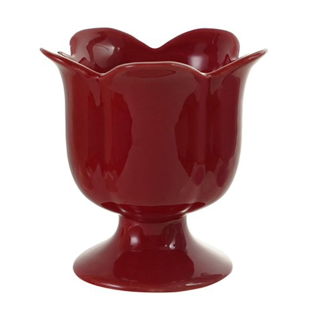 Glossy deep red footed ceramic bowl featuring a flared, flower petal-shaped rim.