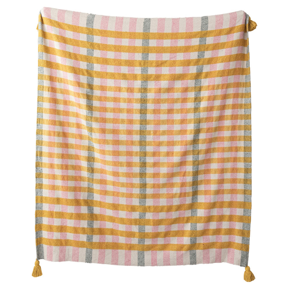 Boho mustard yellow and pink plaid woven throw blanket with corner tassels.