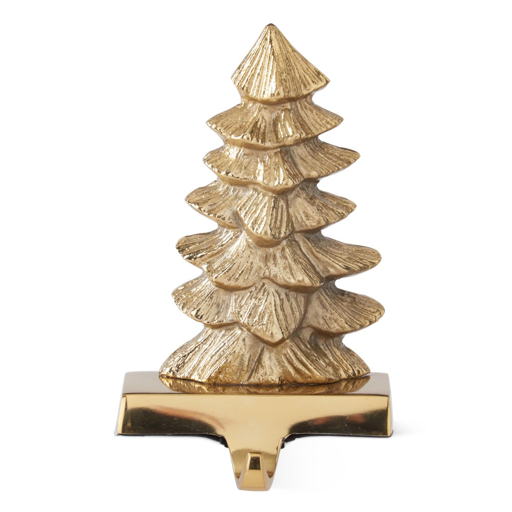 Front view of a polished brass Christmas tree stocking holder with a tiered evergreen design.
