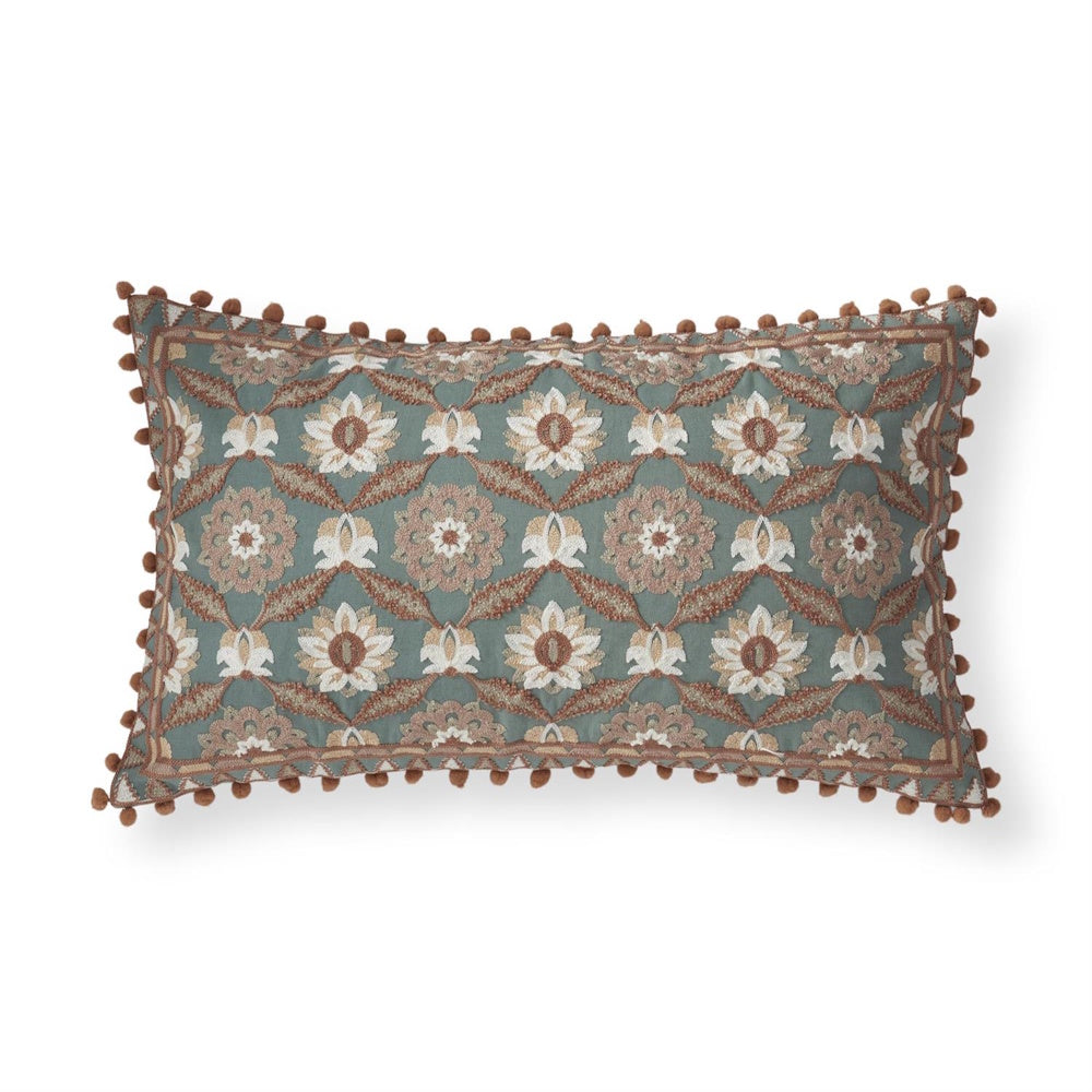 Embroidered teal lumbar pillow with pink and cream floral patterns, featuring a decorative brown pom-pom trim.