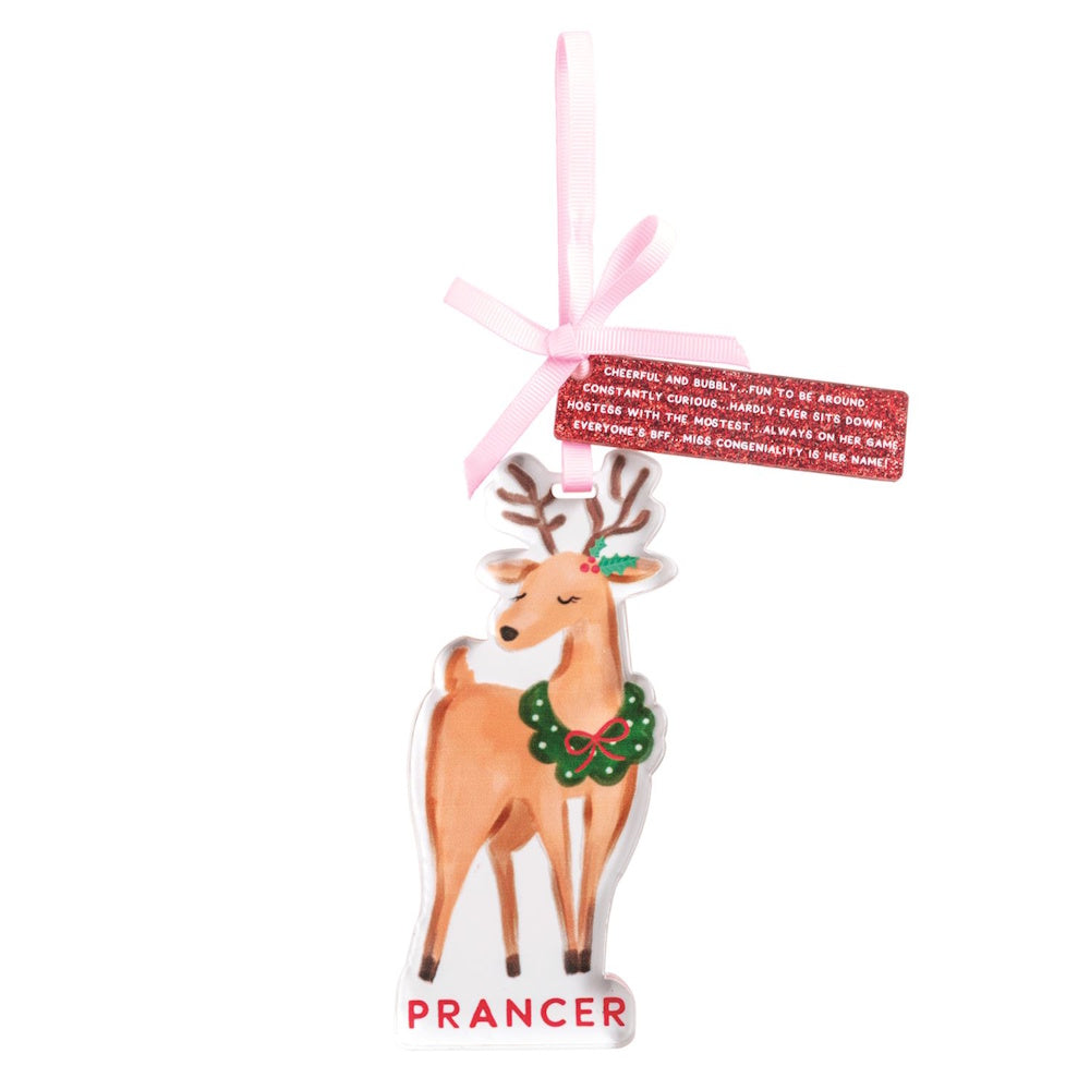 Reindeer ornament labeled "PRANCER" with a green wreath collar, attached pink ribbon, and tag.