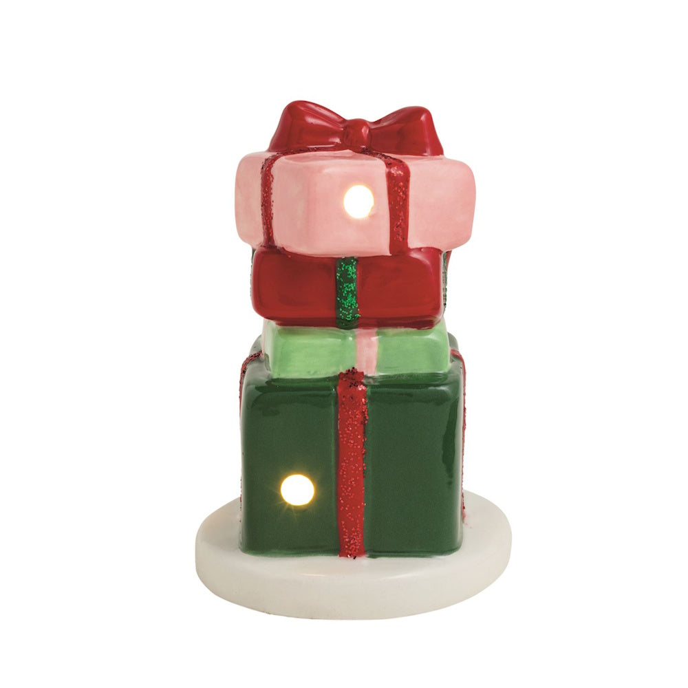Light-up ceramic figurine featuring a stack of colorful wrapped holiday gift boxes topped with a red bow.
