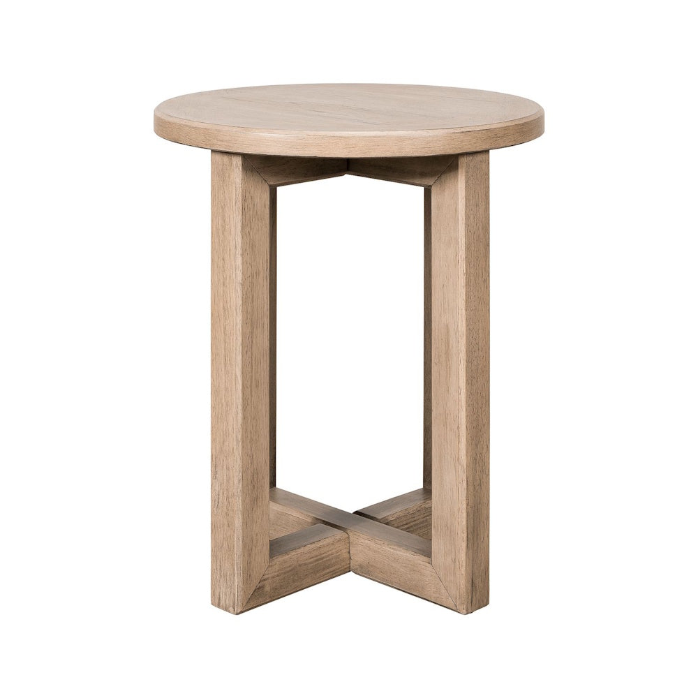 Proximity Place light wood round chairside table with an X-shaped base, side view.