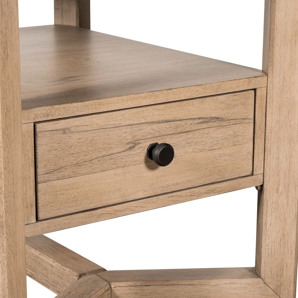Close-up of a light wood rectangular end table with a storage drawer and black knob.