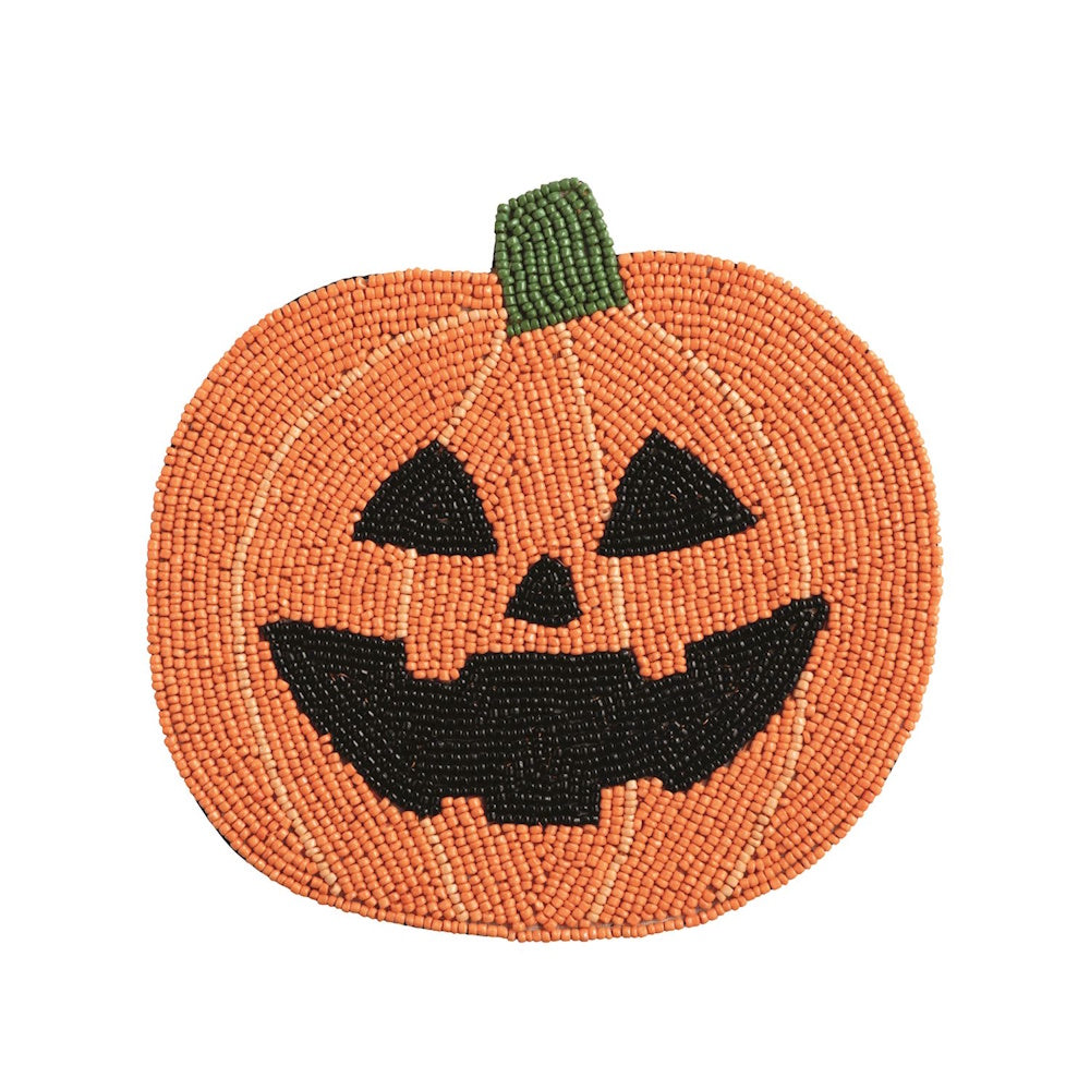 Beaded orange jack-o'-lantern trivet with a smiling face and green stem.