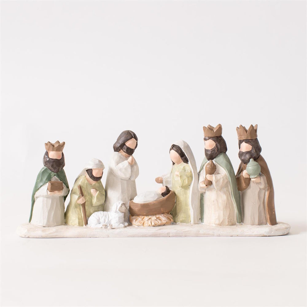 Minimalist faceless nativity scene figurine set with baby Jesus, Mary, Joseph, and the Wise Men.
