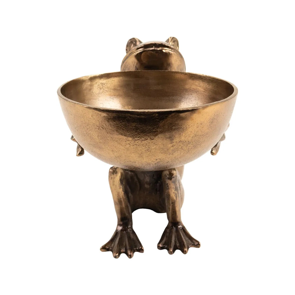 Front view of an antique brass frog sculpture holding a wide decorative bowl, set on a plain white background.