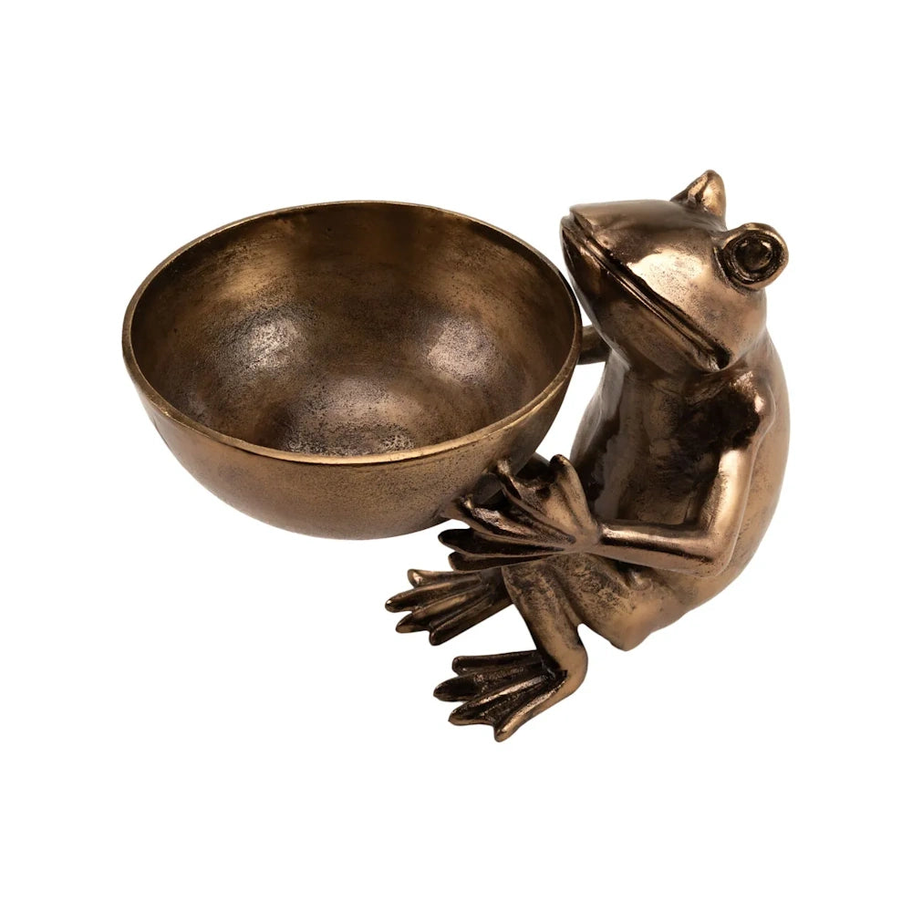 High-angle view of an antique brass frog sculpture holding a round bowl, isolated on a white background.