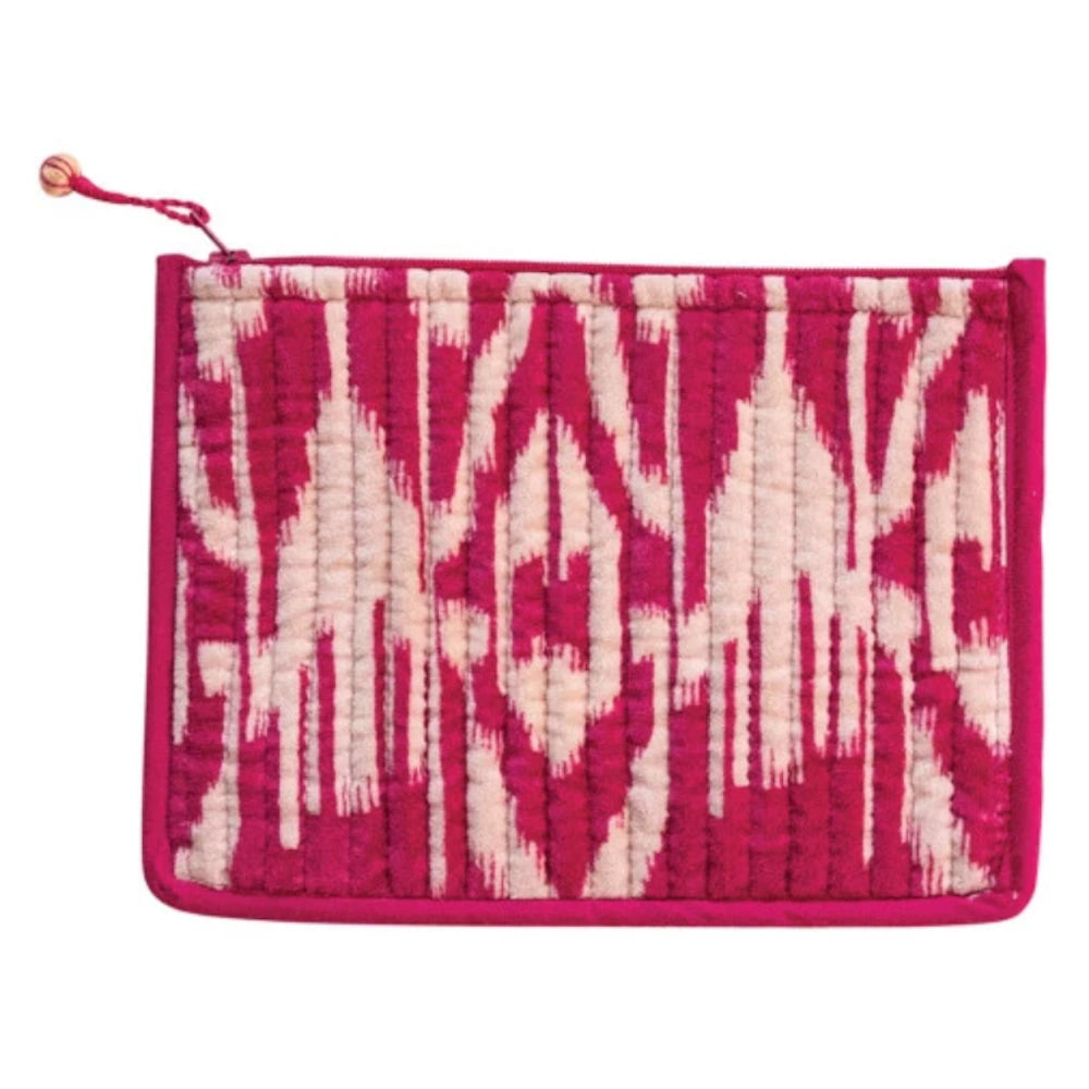 Quilted pink and white ikat print cotton velvet zip pouch with a decorative pink beaded zipper pull.