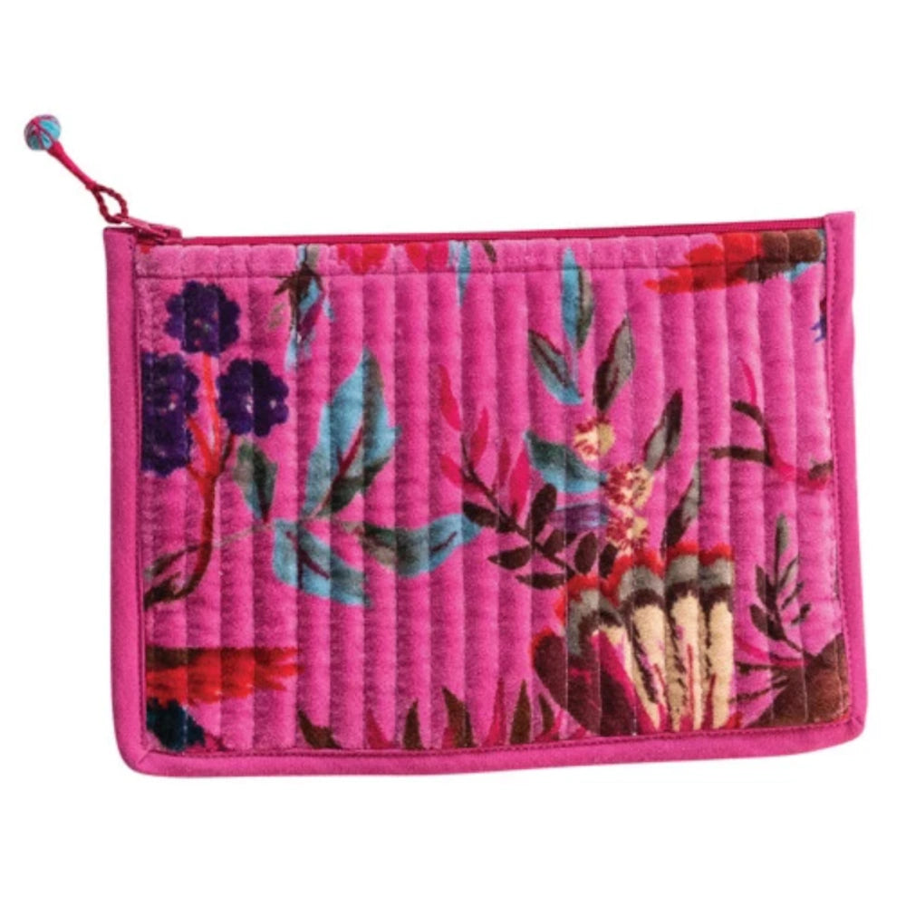 Pink floral quilted velvet zip pouch with purple and teal botanical pattern on a vibrant magenta background.