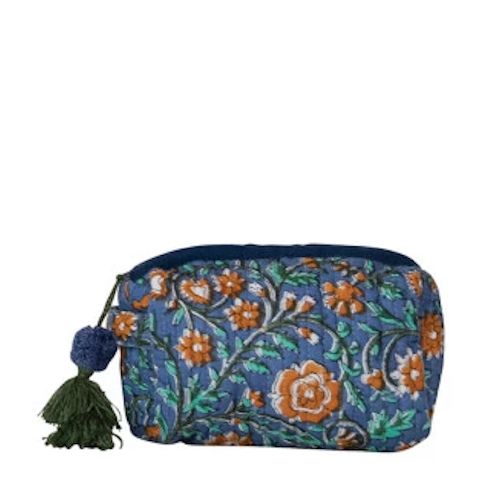 Blue floral quilted cotton zip pouch with orange flowers and a decorative green tassel.