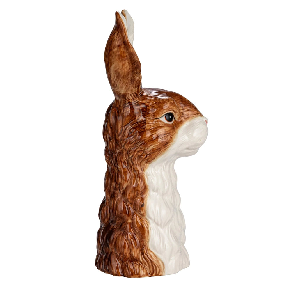Hand-painted rabbit head stoneware vase in brown and white with a glossy finish, isolated on a white background.