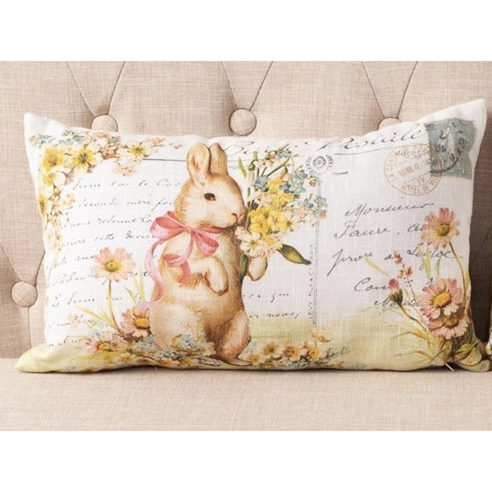 Vintage postcard style pillow featuring an illustrated rabbit with a pink bow and yellow flowers.