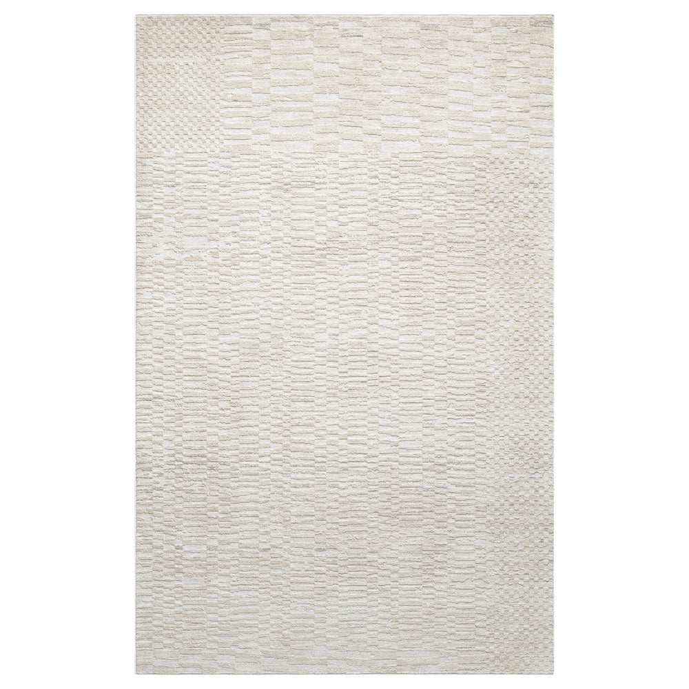 Ivory textured area rug with geometric woven pattern and subtle high low detailing for modern interiors.