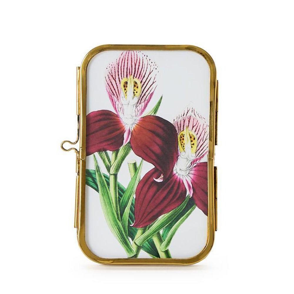 Mini rectangular antique gold metal frame displaying a botanical illustration of pink orchids.