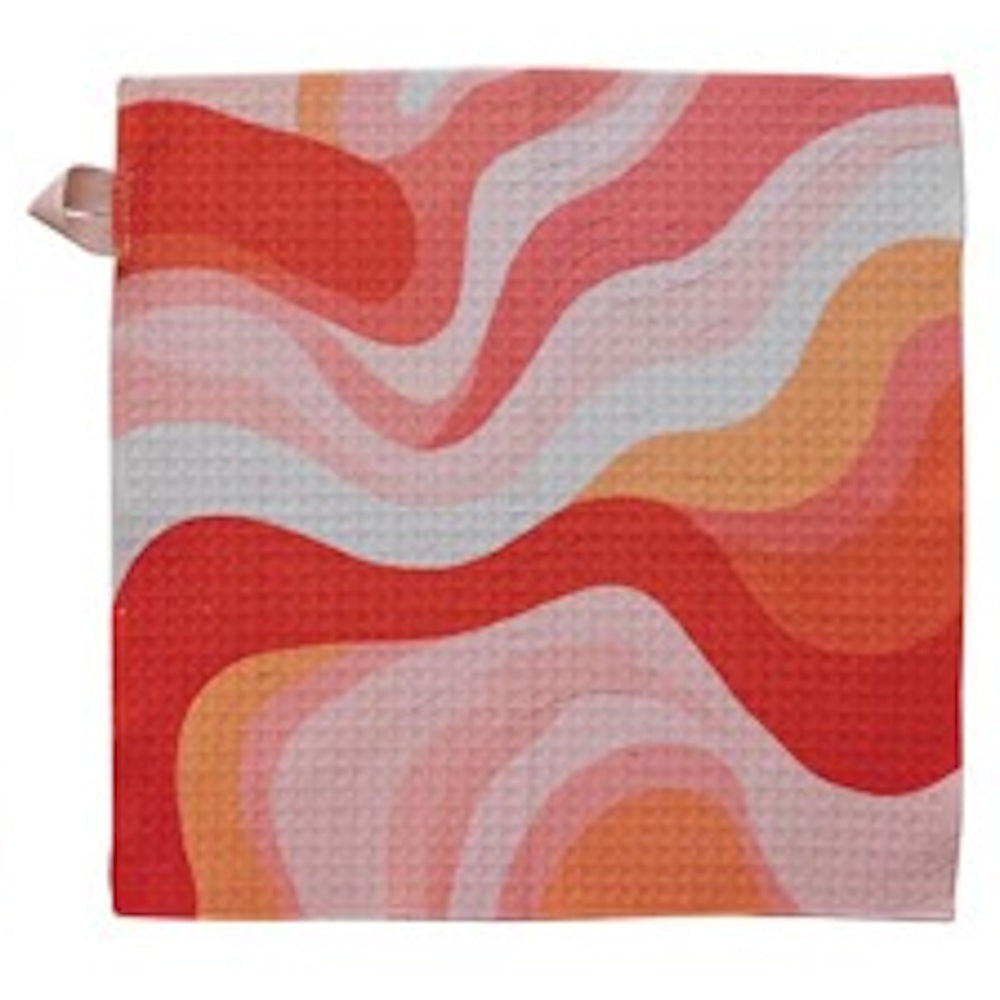Square waffle-textured dish cloth with a retro wavy pattern in shades of red, pink, orange, and white.