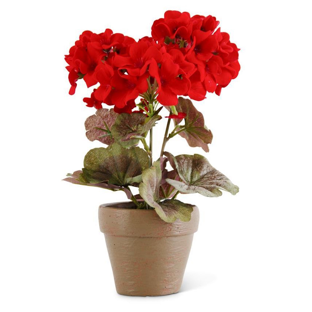 Vibrant red silk geranium plant in a rustic clay pot for indoor home decor and realistic floral arrangements.