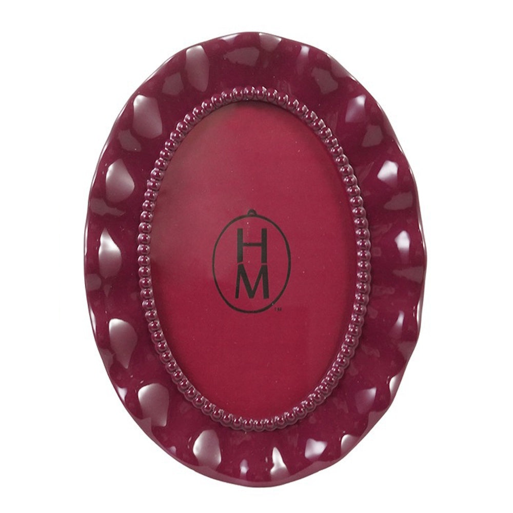 Deep red oval photo frame with wavy, scalloped edges and a beaded inner border.