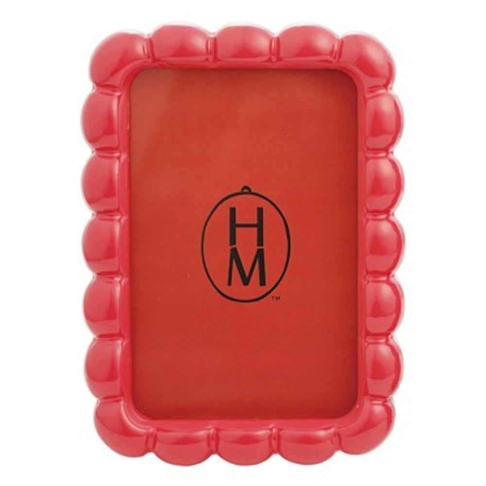 Glossy red resin photo frame with a scalloped, bubbly edge and an HM logo insert on a white background.