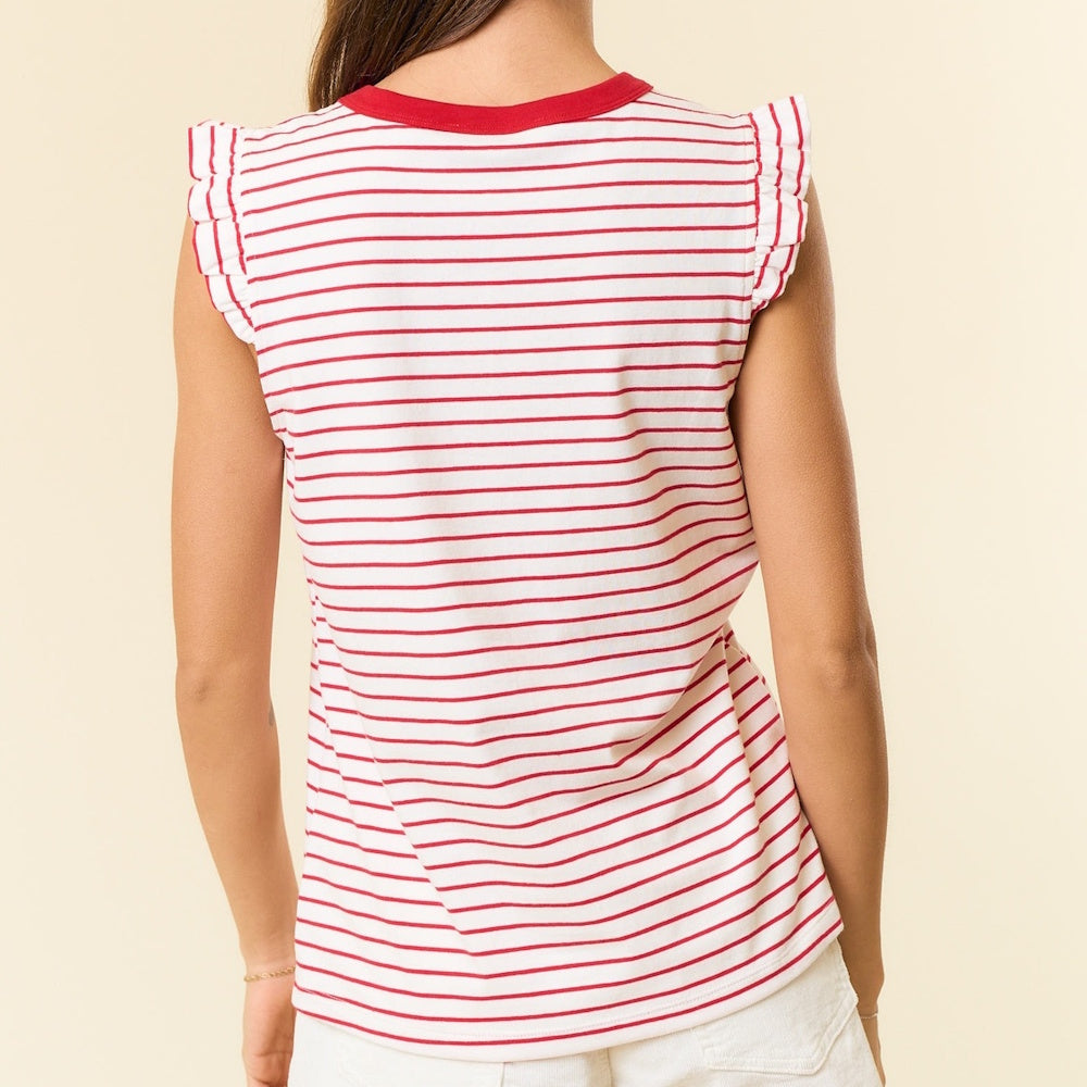 Rear view of a person wearing a red and white striped sleeveless top with ruffled shoulder trim and a red collar.