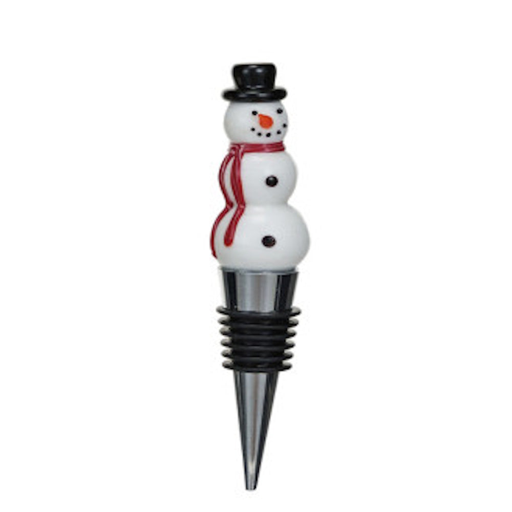 Snowman bottle stopper wearing a black top hat and a red scarf, with a ribbed metal and rubber base.