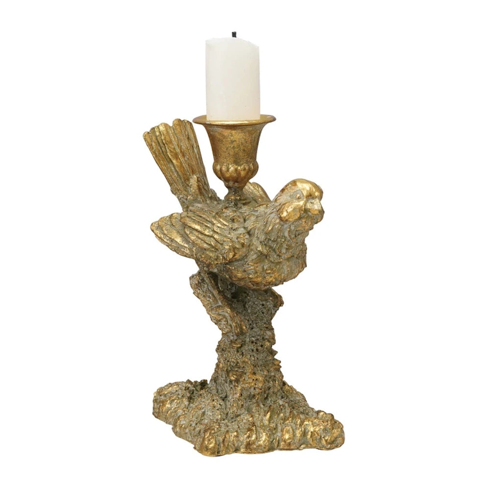Gold resin bird-shaped taper candle holder featuring a textured finish and a white candle on a white background.