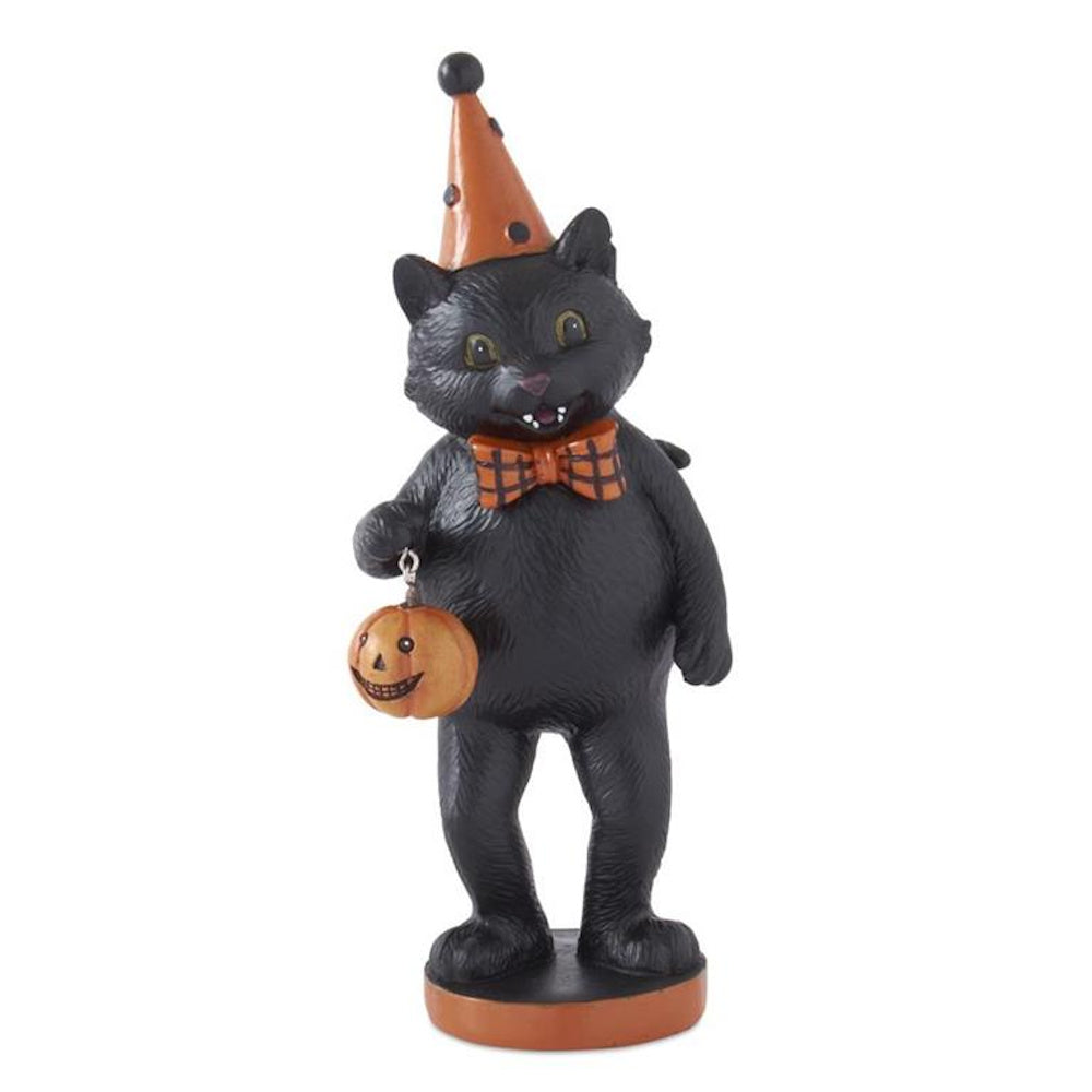 Halloween black cat figurine wearing an orange party hat and bow tie, holding a small jack-o'-lantern.