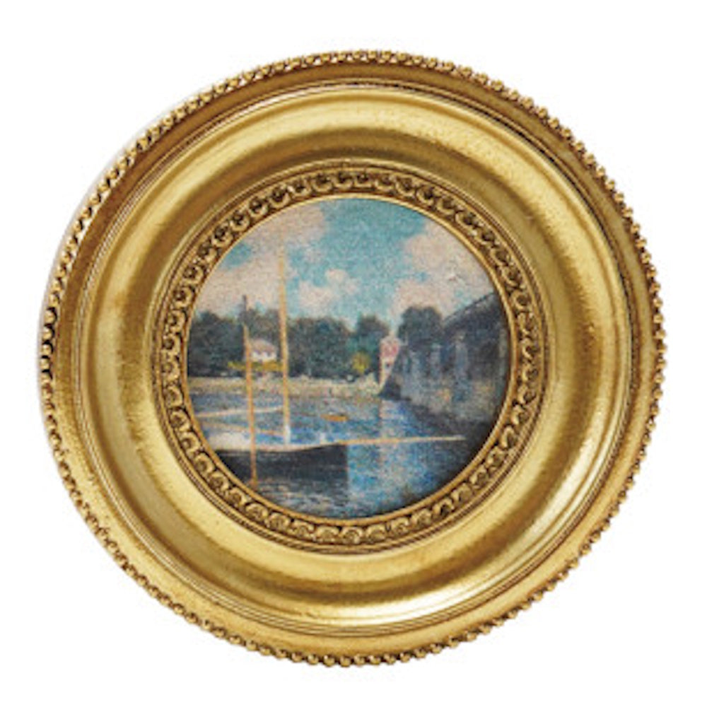 Miniature resin magnet featuring a round gold frame with a vintage Impressionist painting of a boat on a river.
