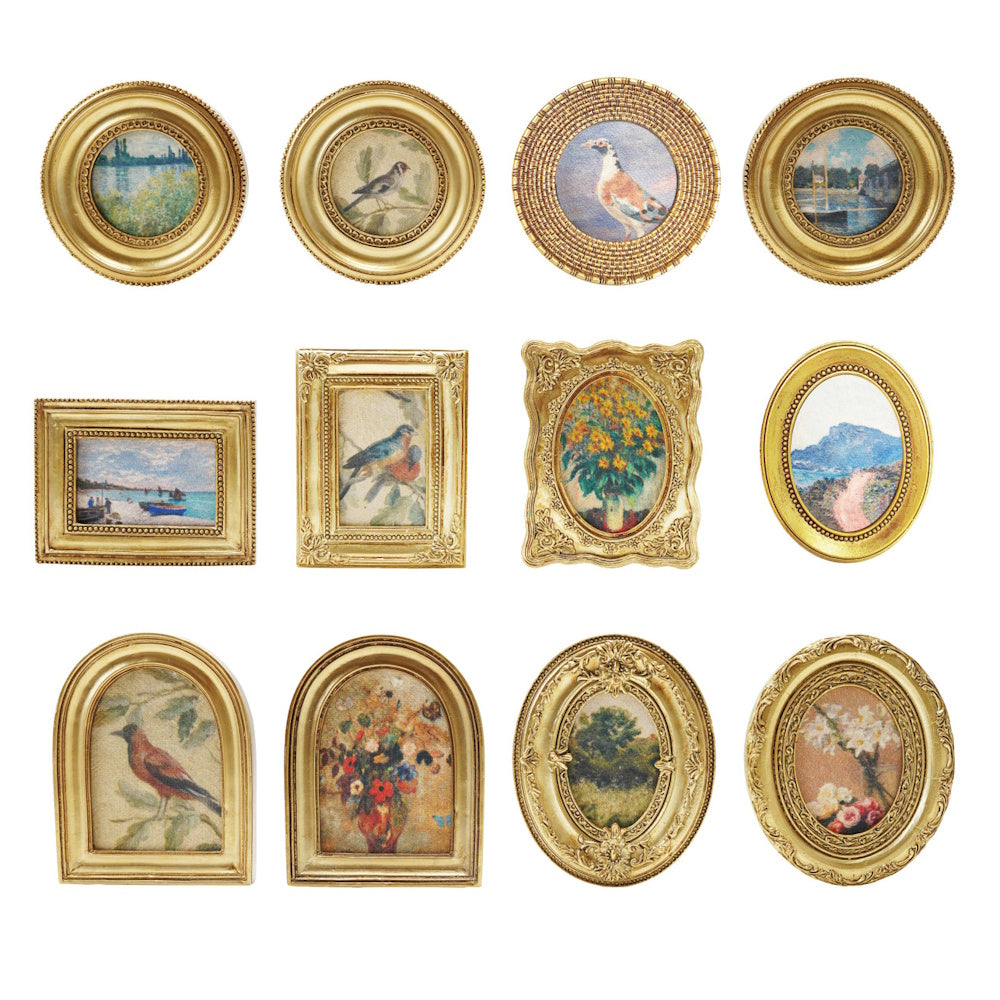 Twelve miniature gold-framed resin magnets featuring various vintage-style paintings of birds, flowers, and landscapes.