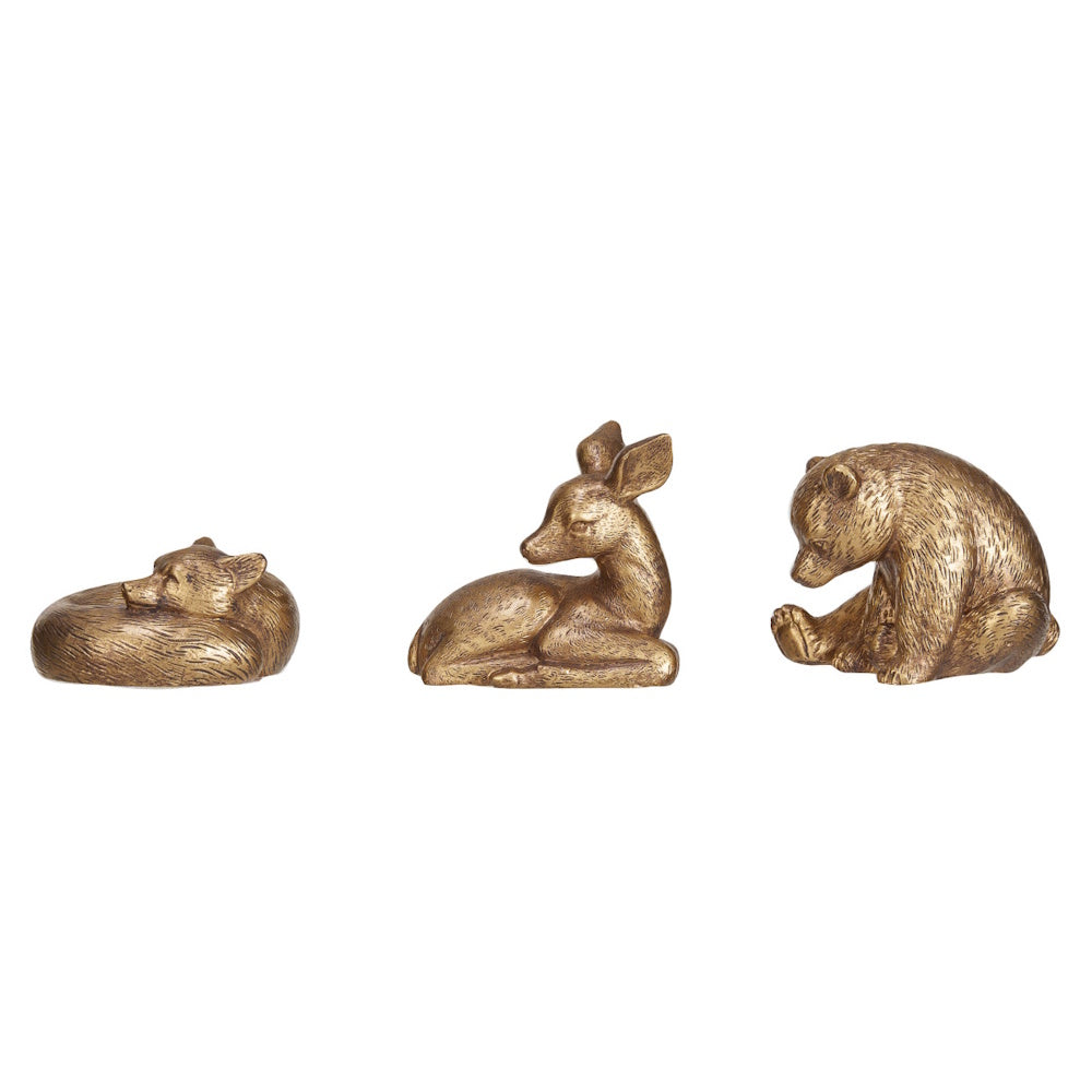 Three bronze figurines of a sleeping fox, deer, and bear.