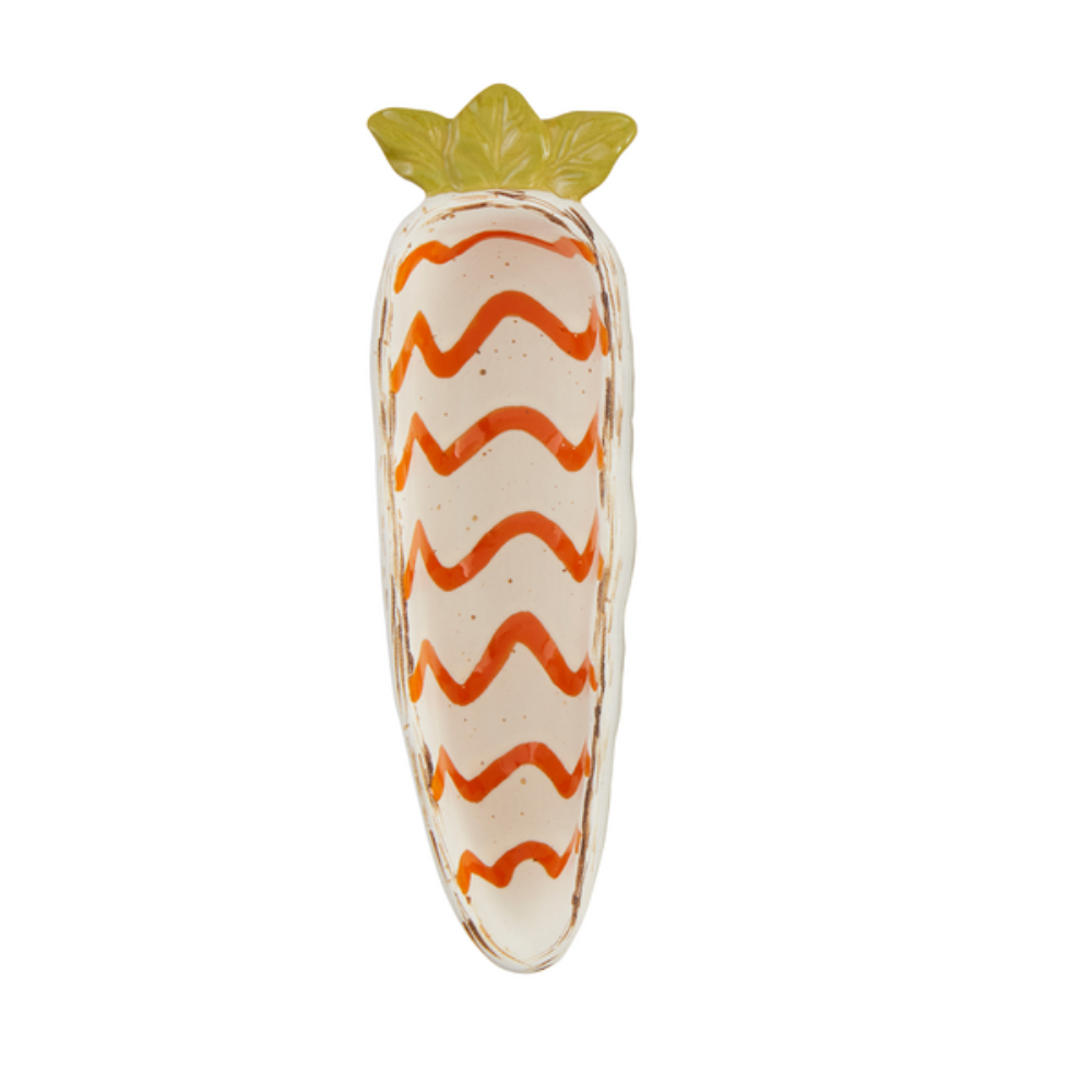 Carrot-shaped ceramic serving dish with orange zig-zag stripes and a green leaf top.