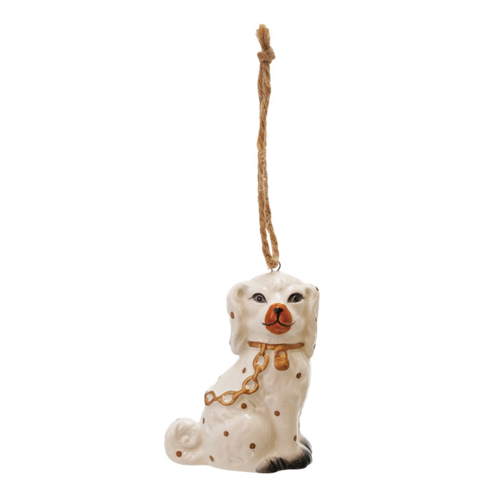 White ceramic Staffordshire dog hanging ornament with brown spots and a gold collar.