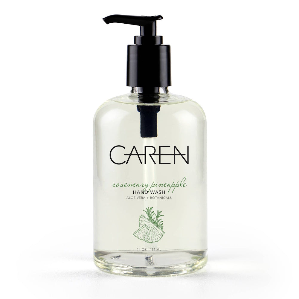 Clear bottle of Caren Rosemary Pineapple Hand Wash with a black pump, featuring a green botanical illustration.