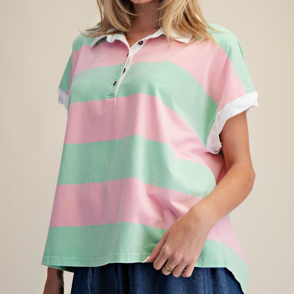 Pink and green rugby stripe washed henley top with a white collar and short sleeves.
