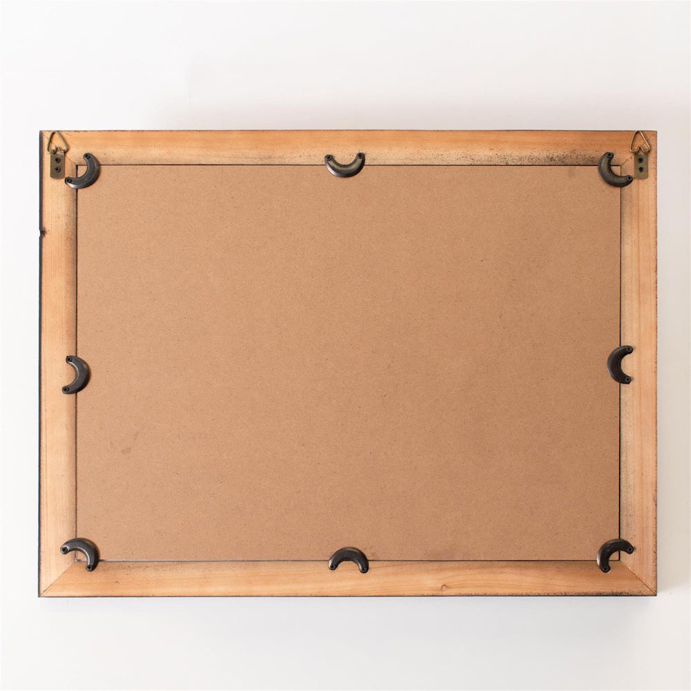 The back of a wooden picture frame with metal turn buttons and hanging hardware on a white background.