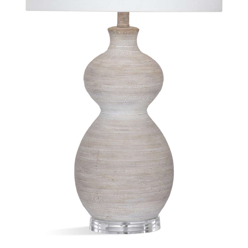 Textured off-white gourd lamp with horizontal ridges and a clear acrylic base.